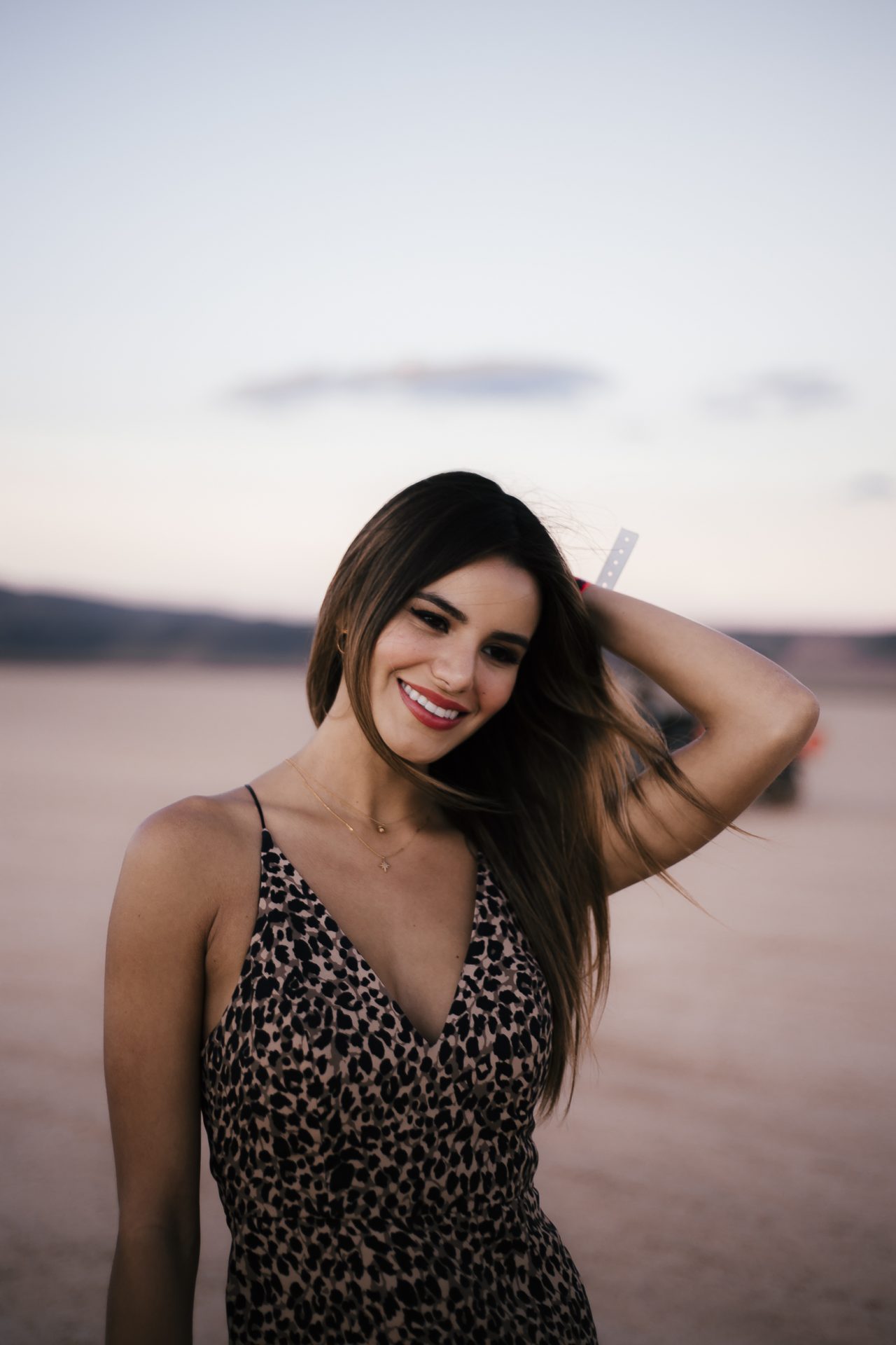 Girl Standing in a Desert